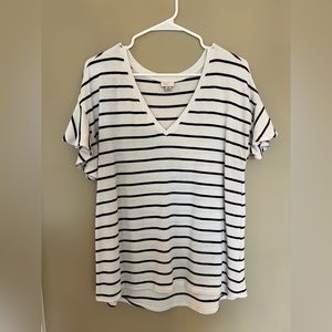 A New Day white and black striped shirt with ruffled sleeves. Size medium.